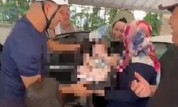 Karaköprü’de Otomobilin kapıları kilitlendi! Mahsur kalan bebeği itfaiye kurtardı