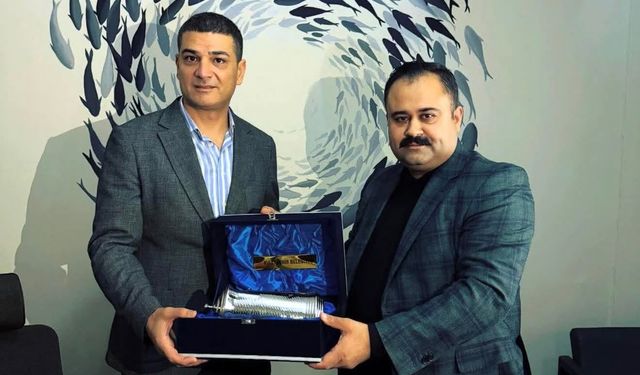 Başkan İnan’dan Başkan Özkan’a Plaket